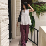 Cordan Punching Flare Button Sleeveless Blouse