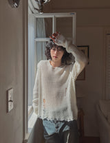 Reverse damage V-neck knitwear