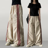 Vito coloring nylon three-line track line wide pants