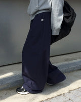 One-pin tuck strap balloon cotton pants