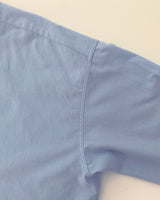 a loosefit cropped shirt, sky blue