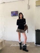 Black hole off-shoulder long-sleeved knitwear