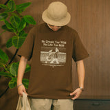 DAKYAM 2025S/S マイルドライフワイルドドリームプリントTシャツ