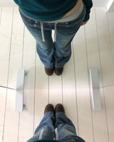 ユネル コントラスト バンディング ブーツカット デニムパンツ