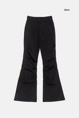 Unbalanced shirring bootcut banding pants