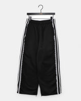 トゥオンフリースレーストラックスウェットパンツ