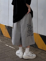 one-pocket lettering bermuda pants