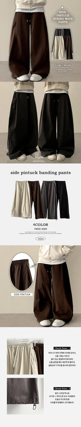 Rogle washed-out banding side pin tuck cotton wide pants