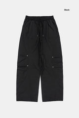 パラボラカーブインシジョンナイロンバンディングパンツ