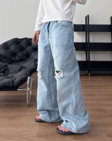 Buen Distressed Flare Denim Pants