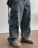 ピンカーブデニムパンツ