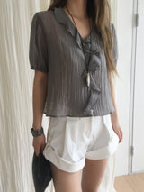 Cascade ruffle blouse