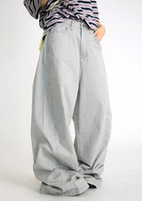 over wide gray pants