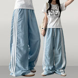 Vito coloring nylon three-line track line wide pants