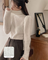 Wool turtleneck puff knit