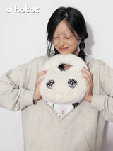 ”crying eyes“ embroidered fur bag
