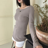 Tirit back slit cross strap punching U-neck off shoulder long sleeve T-shirt
