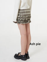 Smocked mini skirt with adjustable buckle