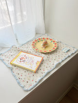 Floral table mat light blue accents