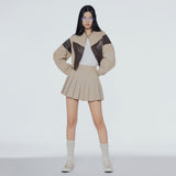 Wrap-front pleated mini skirt