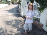 MELT BUTTON OFF-SHOULDER T-SHIRT
