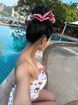 a strawberry tube top bikini