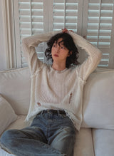 Reverse damage V-neck knitwear
