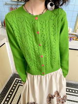 Round neck knitted cardigan sweater with regular shoulder and woolen fabric