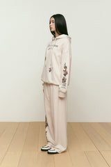 LUNA WASHING VINTAGE GRAPHIC JERSEY PANTS [IVORY]