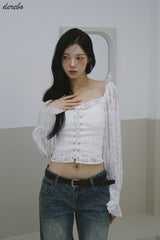 daisy punching strap frill blouse