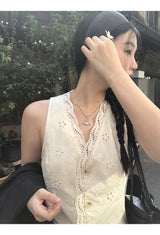パンチングレースベストノースリーブベスト
