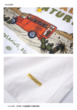 DAKYAM 2025S/S ポスタルジャーニープリンティングTシャツ