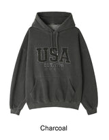 テズカモUSAピグメントフーディー