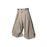 RELABEL Element of Time (cont'd) Horizontal and vertical pleats, elegantly draped silhouette, 8-minute trousers