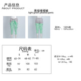 light green pleated pants