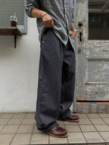 Node single-pleat raw denim jeans