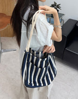 Penan striped shoulder bag