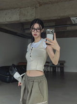 ウィンディブレットボタンリブドスリーブレス