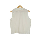 burring sleeveless blouse