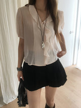 Cascade ruffle blouse