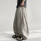 Cuffs line side tuck string sweatpants