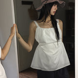 Semble hole string sleeveless blouse