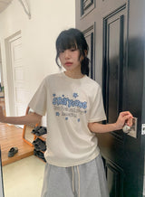ネジュ プリンティング ルーズフィット ショートスリーブ ティー