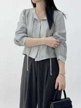 Leche Strap Button Long Sleeve Blouse