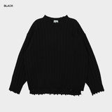 Bold ribbed damage over knit