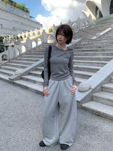 リズムダイアゴナルアンバランスボタンフード長袖Tシャツ