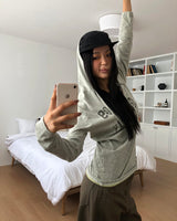 ディアレタリングプリントカラーブロックストラップ長袖フードTシャツ