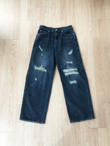 Dirty washed destroyed denim pants