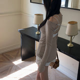 Tirit back slit cross strap punching U-neck off shoulder long sleeve T-shirt