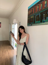 Slit shirring flower long sleeveless dress